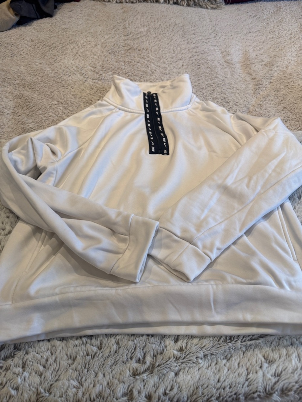 Ladies Nike White Fleece Pullover with Black Neck Tag. Size S. Never worn.
